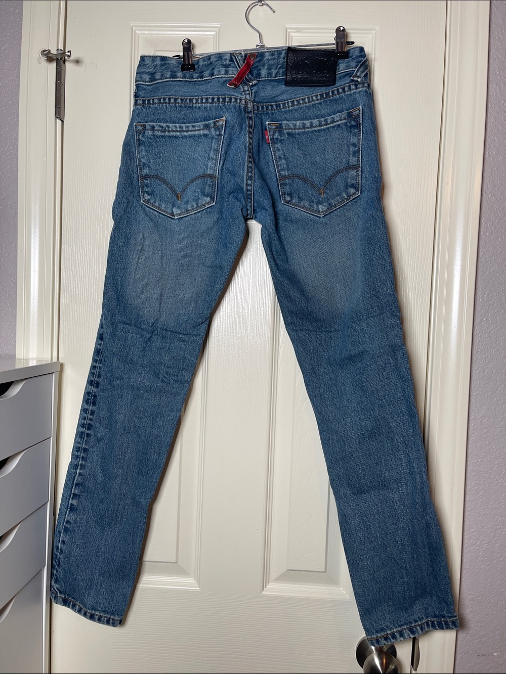 Unique Men's Straight Jeans in Classic Blue Denim with Red Tab